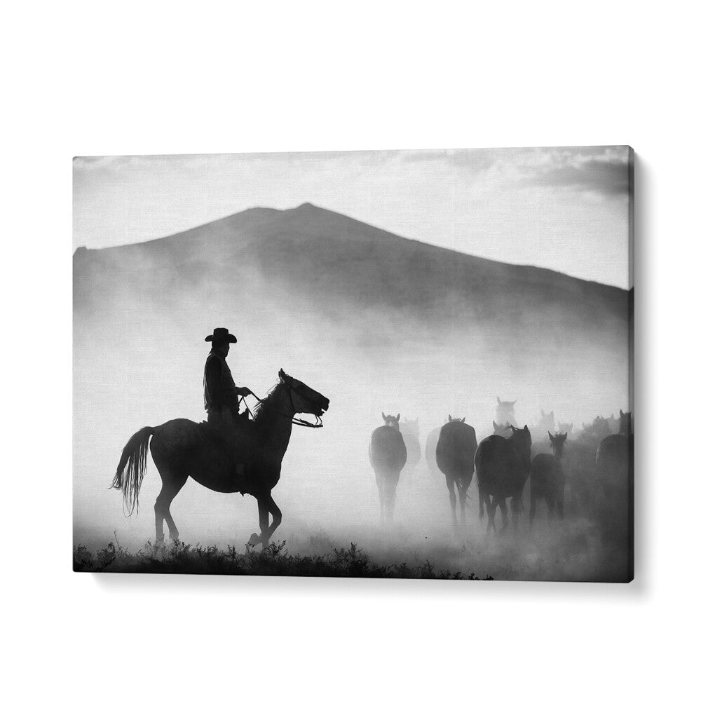 A cowboy rides through misty landscapes in "HIS TERRITORY! , PHOTOGRAPHY PRINTS," capturing nature's majesty.
