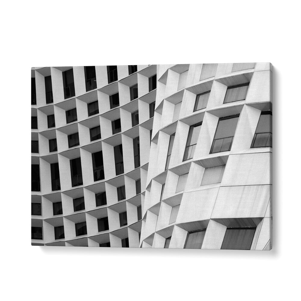 CURVED I, PHOTOGRAPHY PRINTS showcase striking urban architecture in a captivating black and white design.