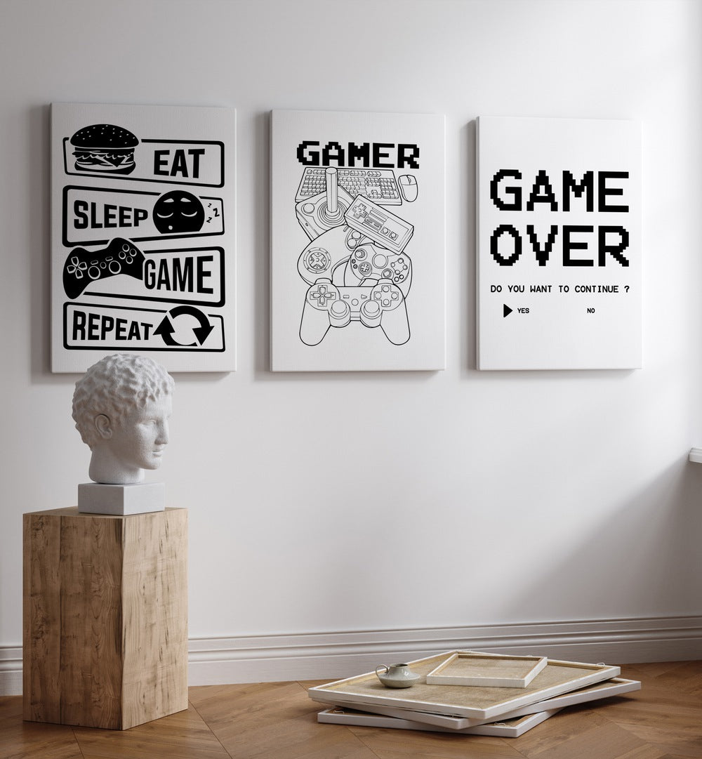 Transform your space with GAMERS, SET OF 3 PAINTINGS featuring iconic gaming phrases and modern design.