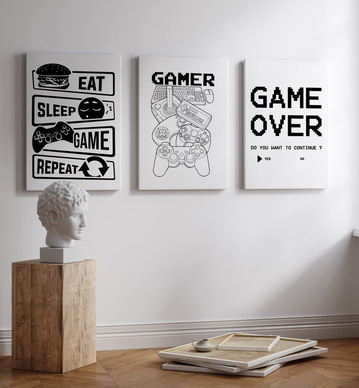 Transform your space with GAMERS, SET OF 3 PAINTINGS featuring iconic gaming phrases and modern design.