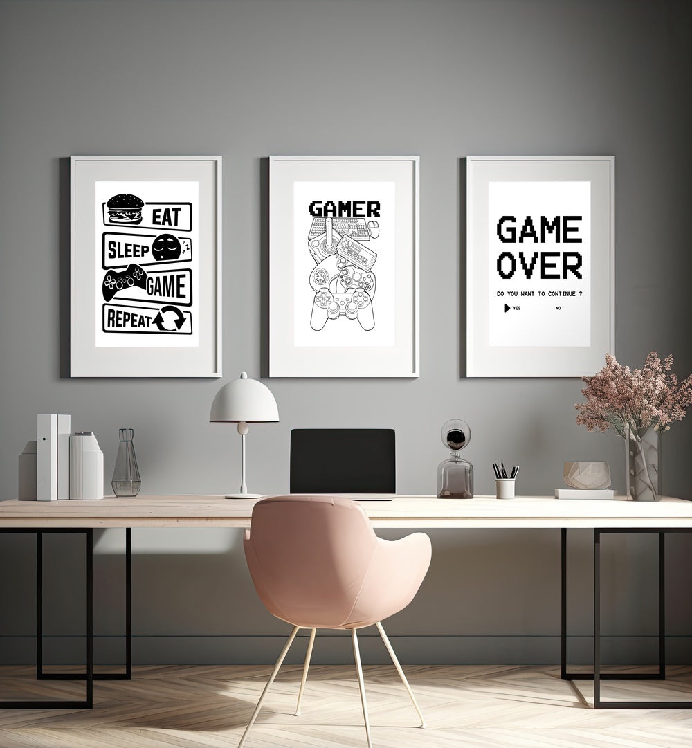 Elevate your space with GAMERS, SET OF 3 PAINTINGS featuring iconic gaming phrases and modern design.