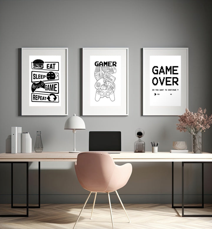 Elevate your space with GAMERS, SET OF 3 PAINTINGS featuring iconic gaming phrases and modern design.