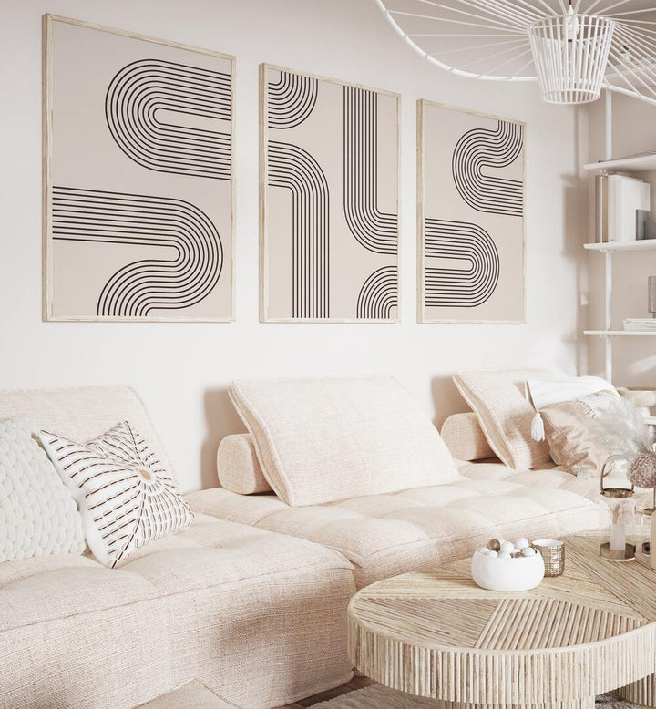 Stylish living room featuring GEOMETRICAL LINES BOHO STYLE, SET OF 3 PAINTINGS, enhancing modern decor.