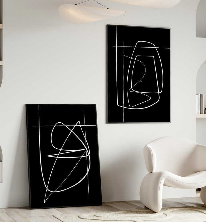 Elevate your decor with the INVERTED ABSTRACTION SET, SET OF 2 PAINTINGS featuring bold black-and-white designs.