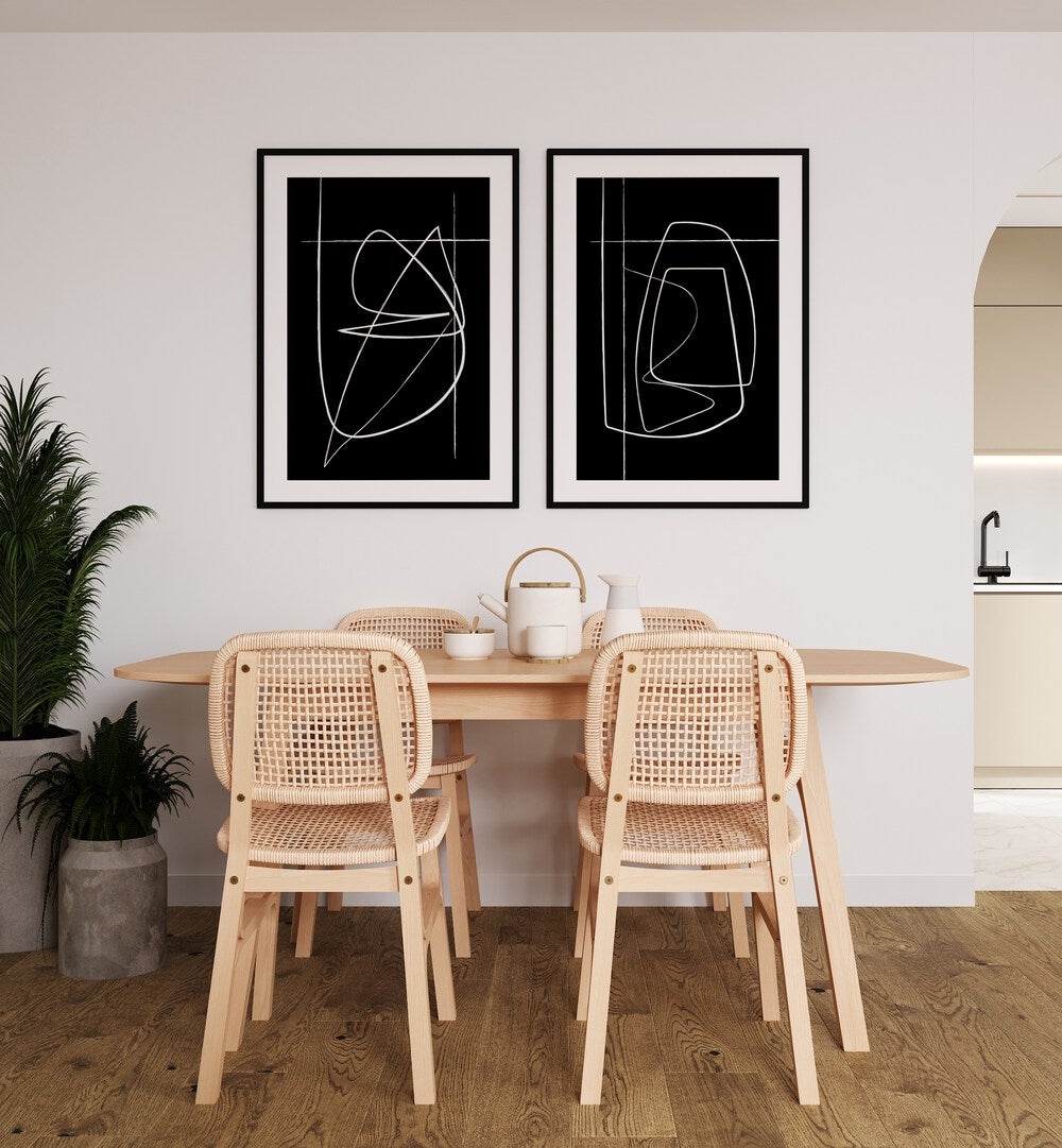 Elevate your decor with the INVERTED ABSTRACTION SET, SET OF 2 PAINTINGS in striking black and white designs.