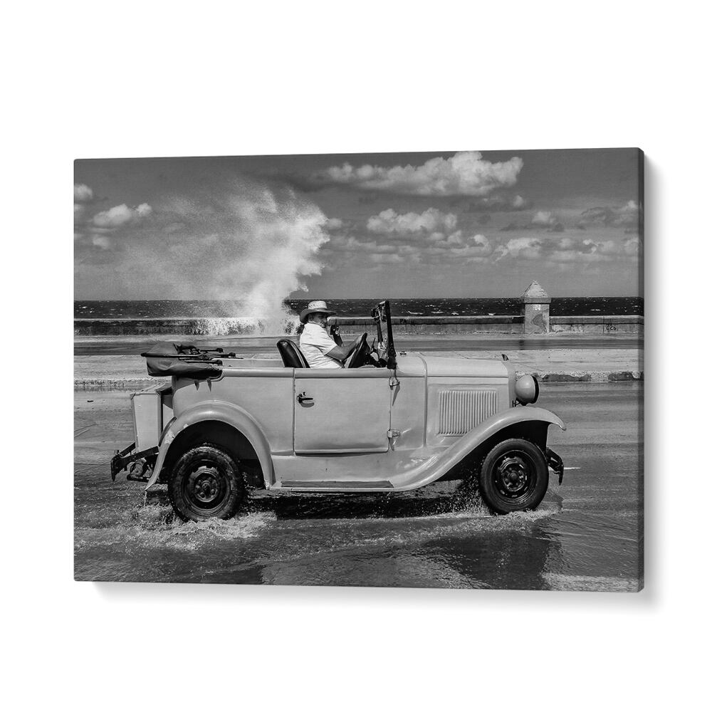 Classic car splashes through waves on Malecon, capturing urban life in MALECON, PHOTOGRAPHY PRINTS. Perfect for art lovers.