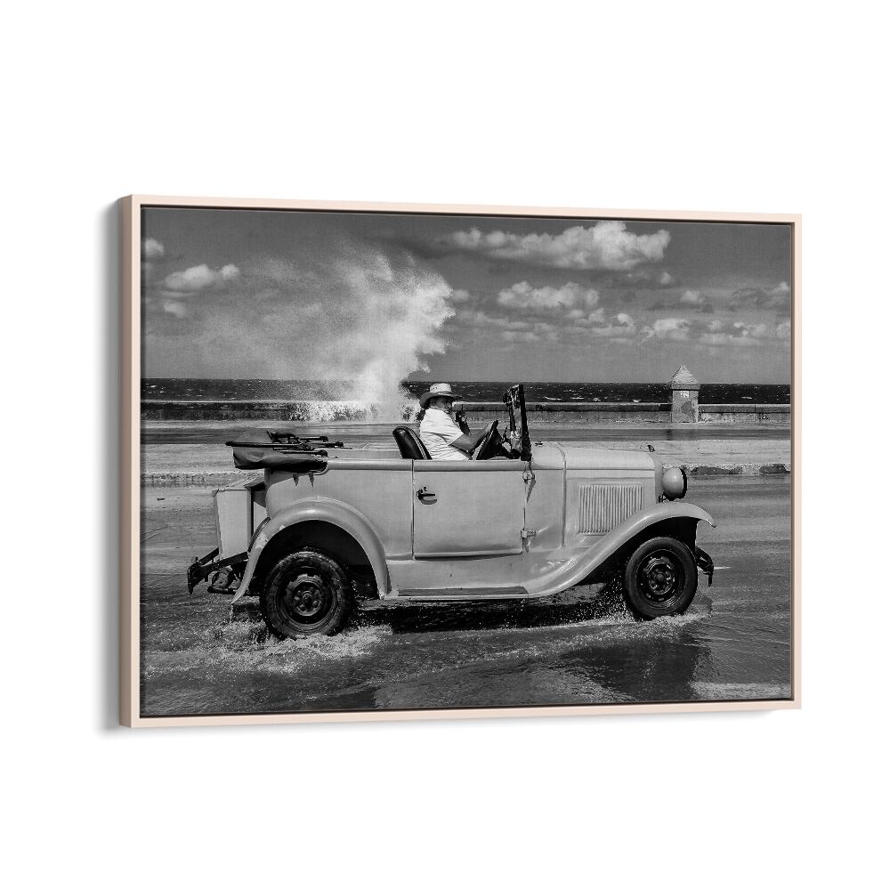 Classic car splashes through water, showcasing the charm of Malecon, captured in stunning MALECON, PHOTOGRAPHY PRINTS.
