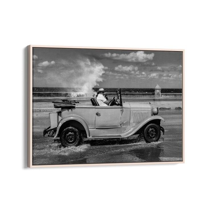 Classic car splashes through water, showcasing the charm of Malecon, captured in stunning MALECON, PHOTOGRAPHY PRINTS.