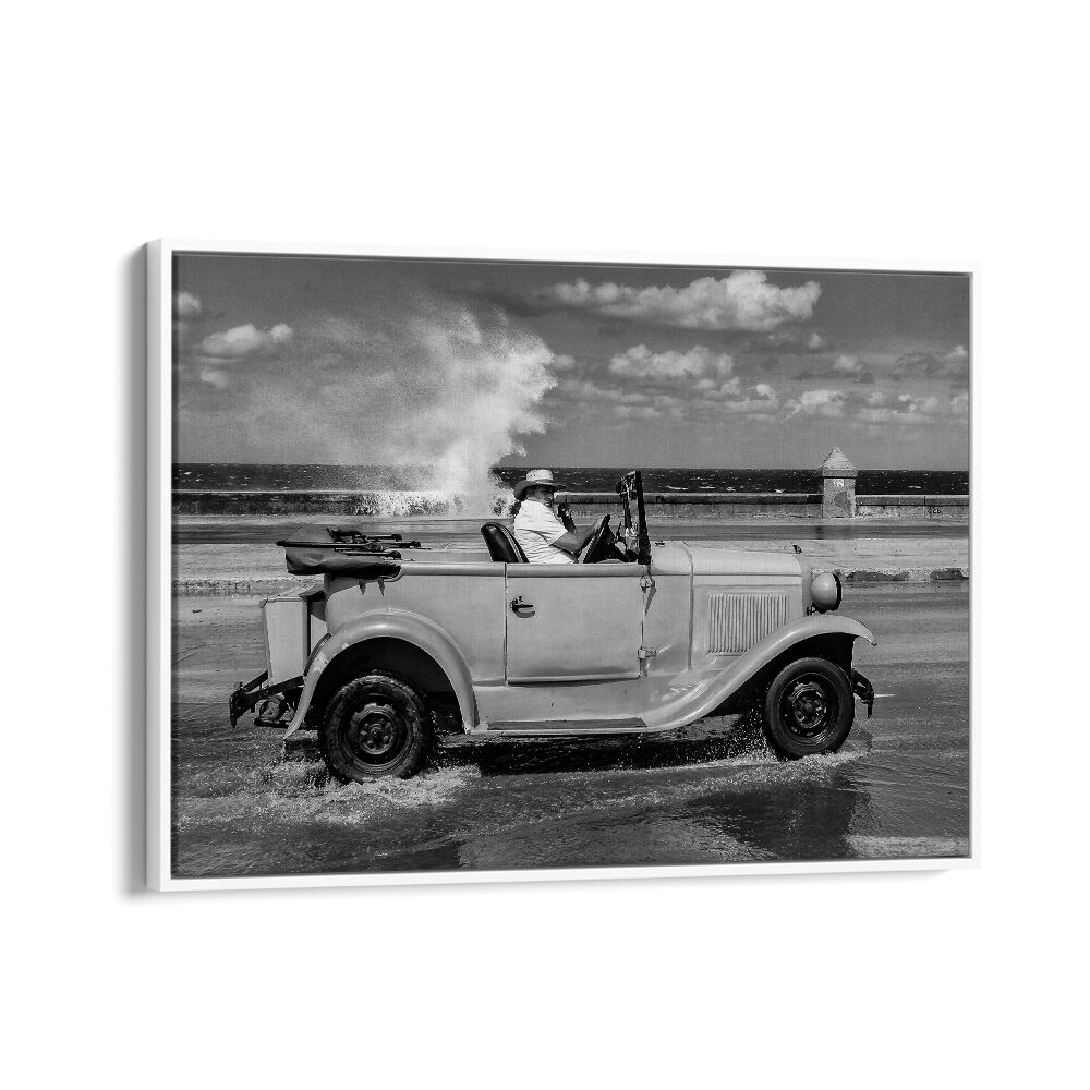 Classic car splashes through waves along Malecon, capturing urban life in stunning MALECON, PHOTOGRAPHY PRINTS.