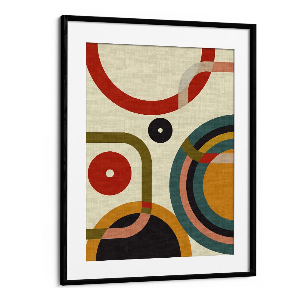 MID CENTURY CIRQUE, ABSTRACT PAINTINGS by Ana Rut Bre features vibrant geometric shapes in a sleek black frame.