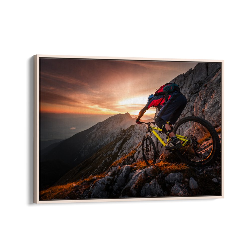 Mountain biker navigating rocky terrain at sunset, showcasing the GOLDEN HOUR HIGH ALPINE RIDE, PHOTOGRAPHY PRINTS.