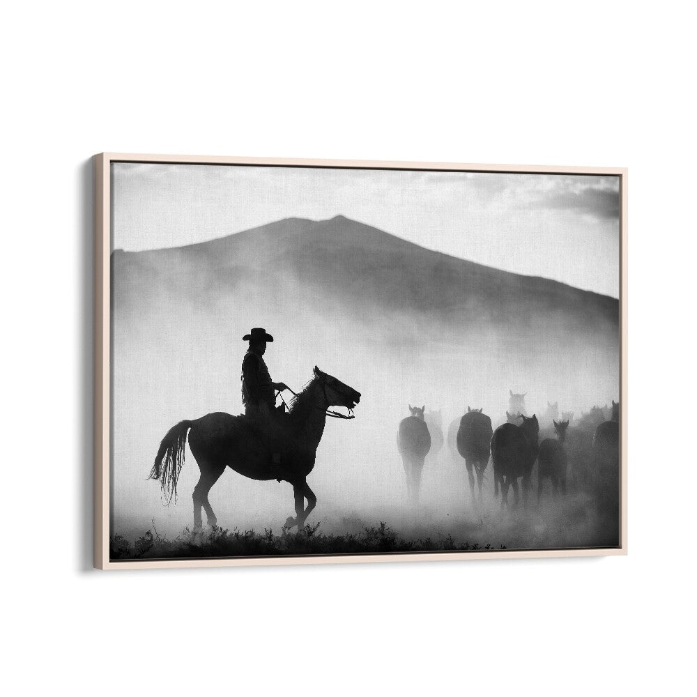 Silhouetted cowboy guiding a herd of horses in misty mountains, perfect for HIS TERRITORY! , PHOTOGRAPHY PRINTS.
