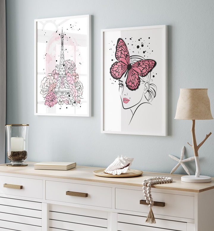 Transform your space with the PINK LADY SET, SET OF 2 PAINTINGS featuring the Eiffel Tower and pink butterflies.