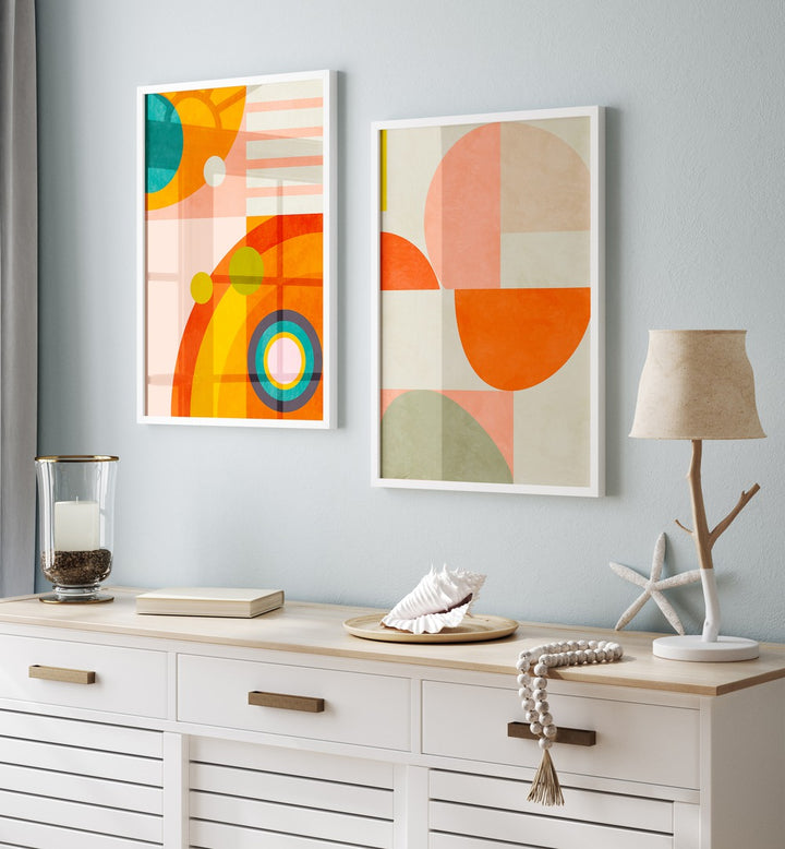 Brighten your space with SHAPES OF ABSTRACT, SET OF 2 PAINTINGS featuring vibrant colors and geometric designs.