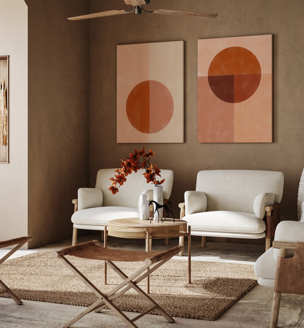 Stylish living room featuring the SUMMER SUN, SET OF 2 PAINTINGS, adding warmth and modern minimalism to the decor.