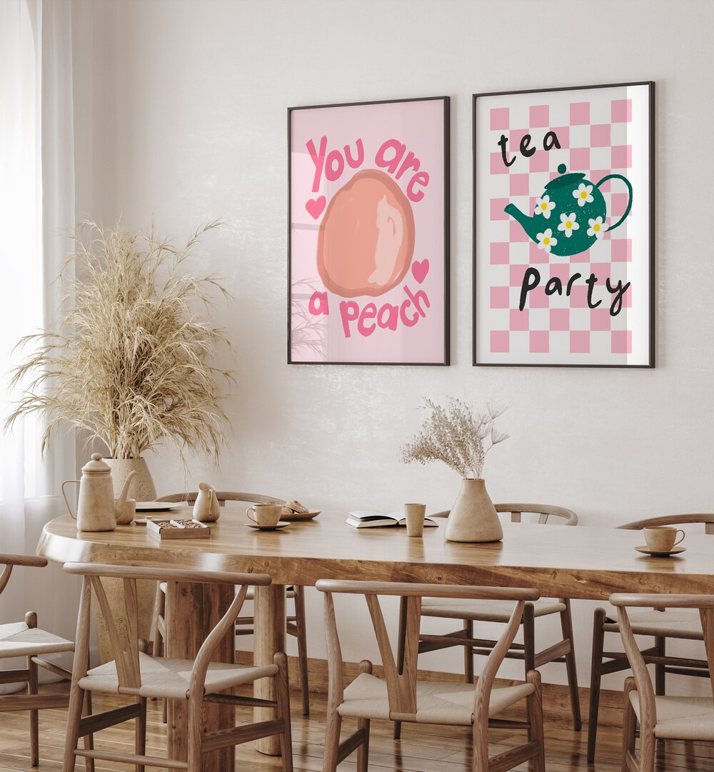 Brighten your kitchen with the whimsical TEA PARTY, SET OF 2 PAINTINGS featuring charming fruit designs.