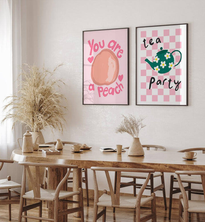 Brighten your kitchen with the whimsical TEA PARTY, SET OF 2 PAINTINGS featuring charming fruit designs.
