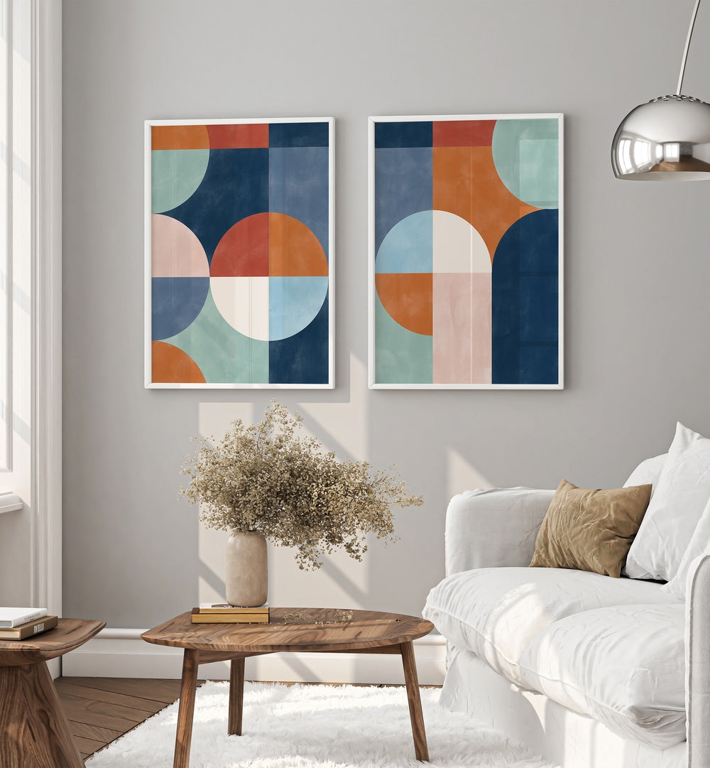 Transform your decor with VIVID GEO SHAPES, SET OF 2 PAINTINGS, featuring colorful abstract geometric designs.
