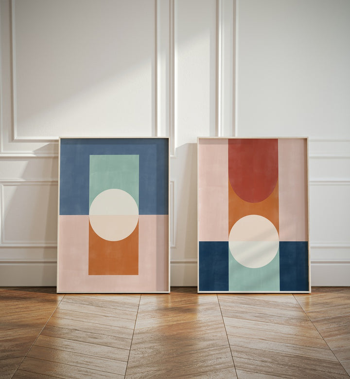 Brighten your space with VIVID SHAPES, SET OF 2 PAINTINGS featuring stunning geometric designs in blue and rust tones.