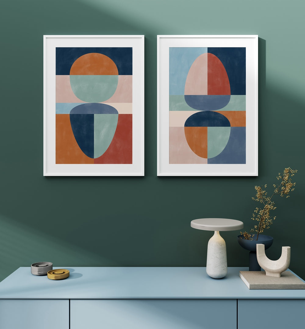 Decorate your space with VIVID TONED SHAPES, SET OF 2 PAINTINGS, enhancing any room with modern elegance.
