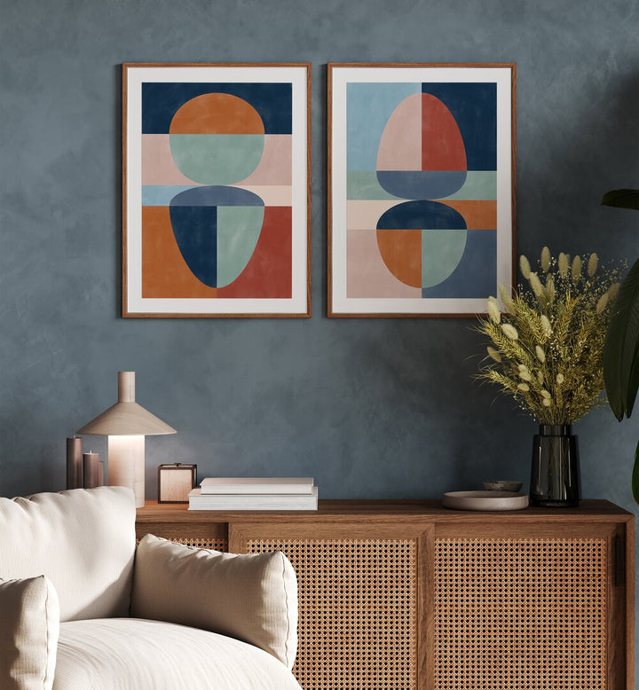 Enhance your decor with VIVID TONED SHAPES, SET OF 2 PAINTINGS, perfect for modern elegance in any space.