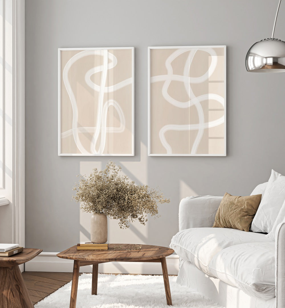 Enhance your space with WHITE BRUSH STROKES, SET OF 2 PAINTINGS, featuring elegant abstract designs and bold lines.