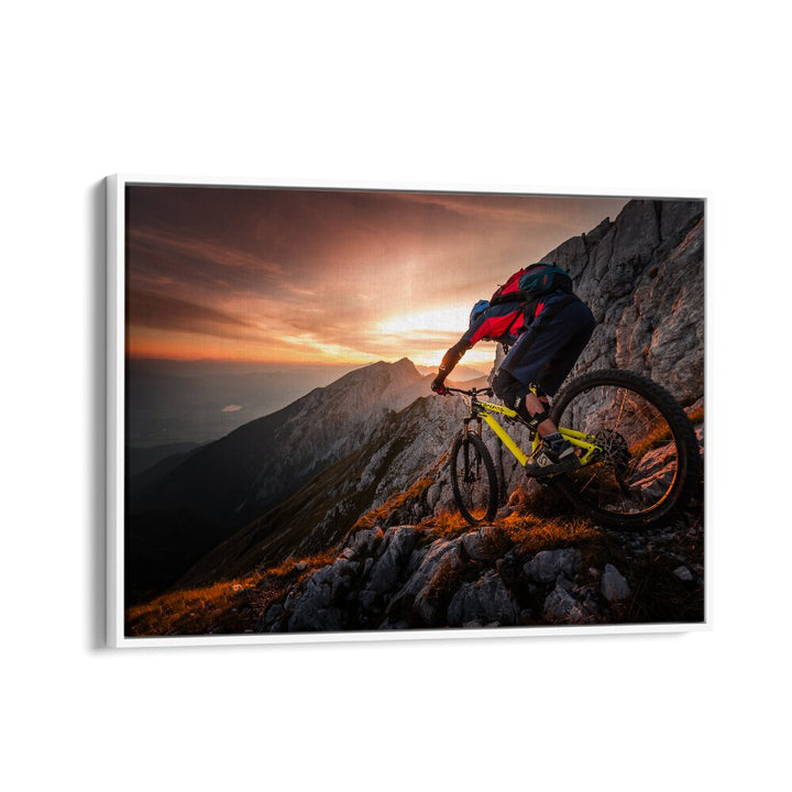 Captivating cyclist conquering rugged terrain during sunset in GOLDEN HOUR HIGH ALPINE RIDE, PHOTOGRAPHY PRINTS.