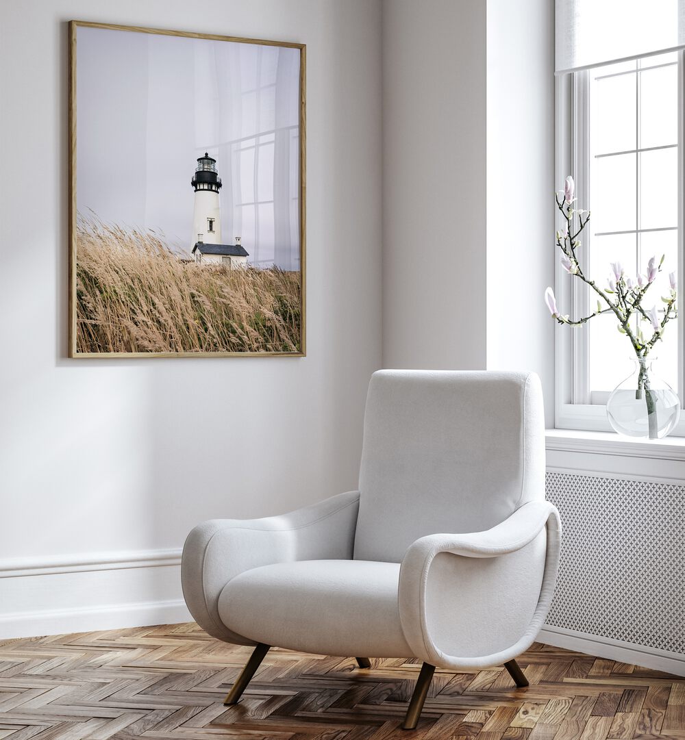 Lighthouse beach paintings enhance your decor, showcasing modern design in a bright, inviting space.