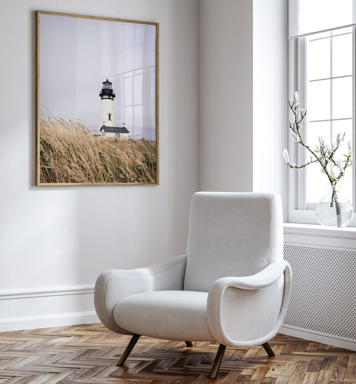 Lighthouse beach paintings enhance your decor, showcasing modern design in a bright, inviting space.