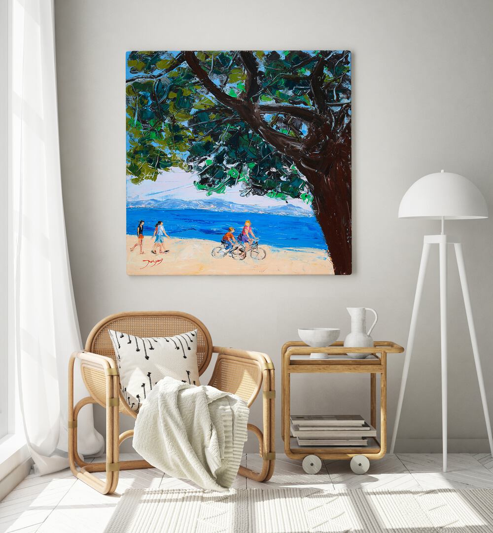 Vibrant ON VACATION, BEACH PAINTINGS decorates a cozy living space, capturing sunlit beach scenes and joyful moments.