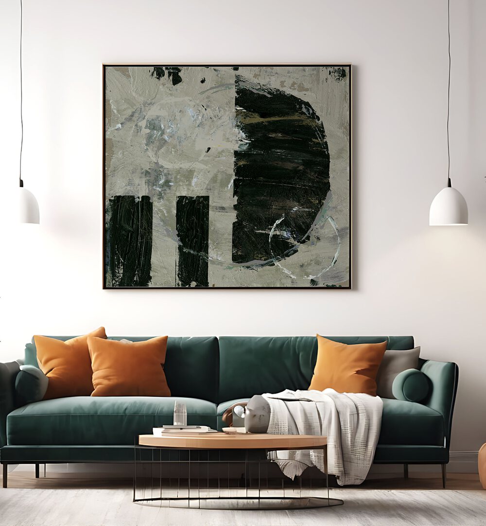 Stunning HALFMOON, ABSTRACT PAINTINGS displayed above a stylish green couch, enhancing modern home decor.