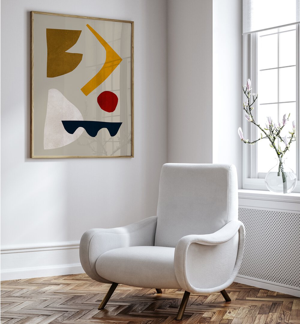 Stylish living room featuring EXPRESSIVE III, GEOMETRIC ART PRINTS framed above a modern chair for artistic ambiance.