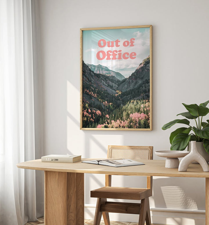 Stylish OUT OF OFFICE, QUOTES poster in a bright workspace, enhancing productivity and relaxation vibes.