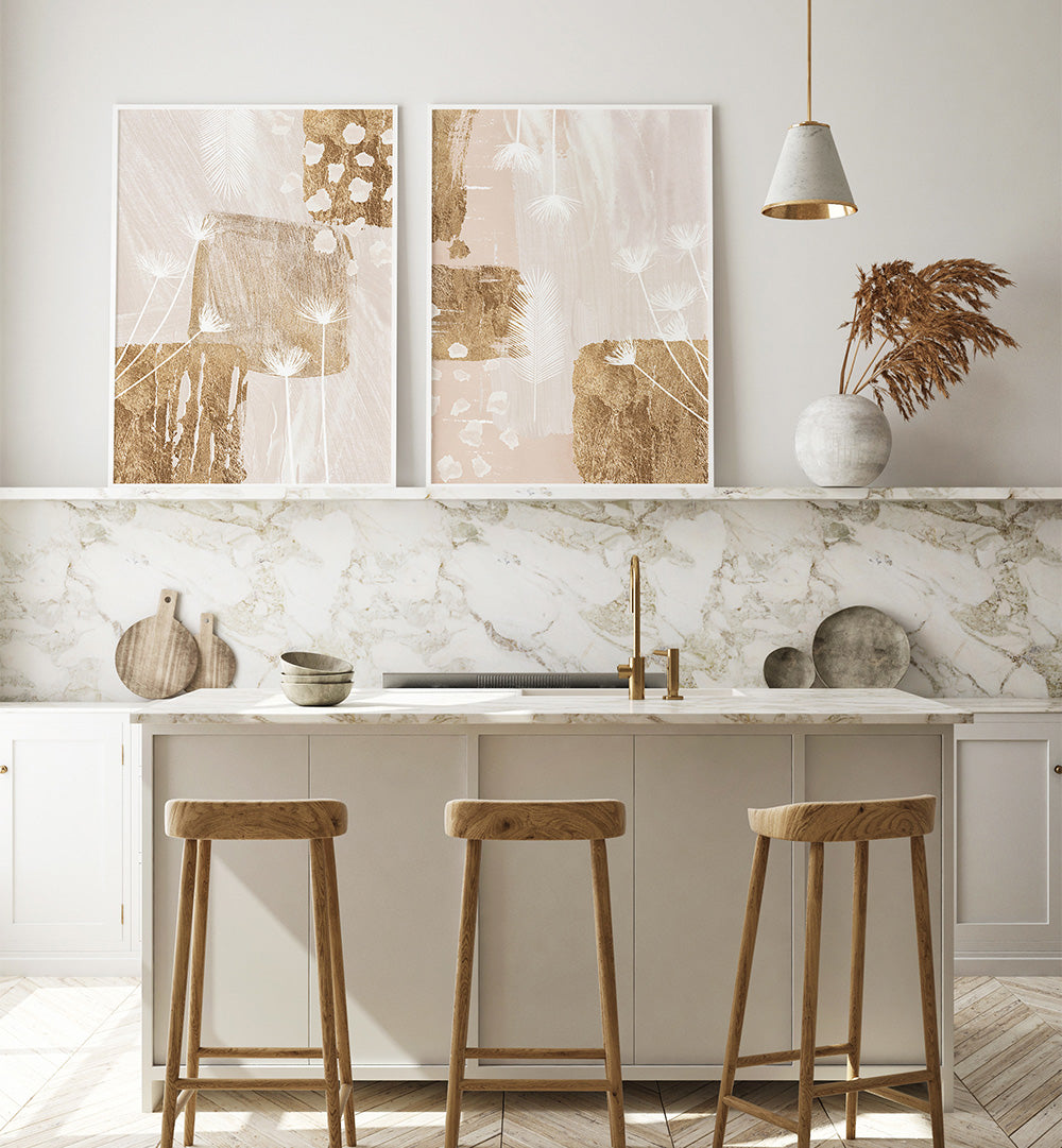 Modern kitchen with marble backsplash, abstract wall art, and wooden stools.