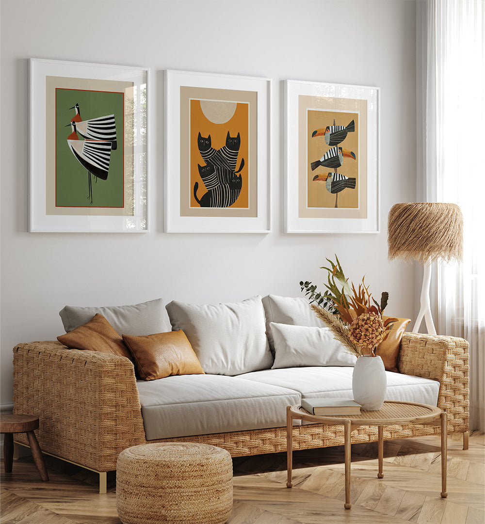 Living room with wicker sofa, decorative pillows, and wall art.