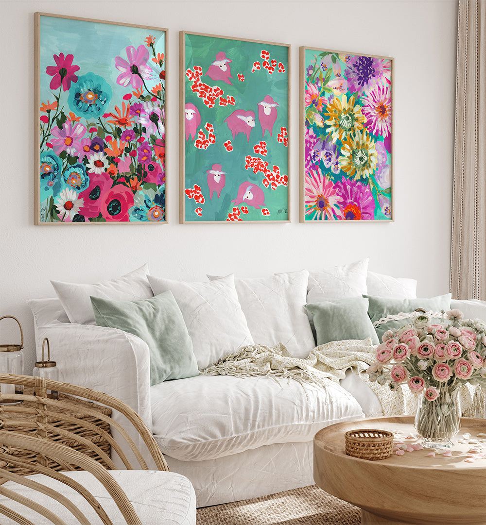 Living room with floral wall art and a white sofa