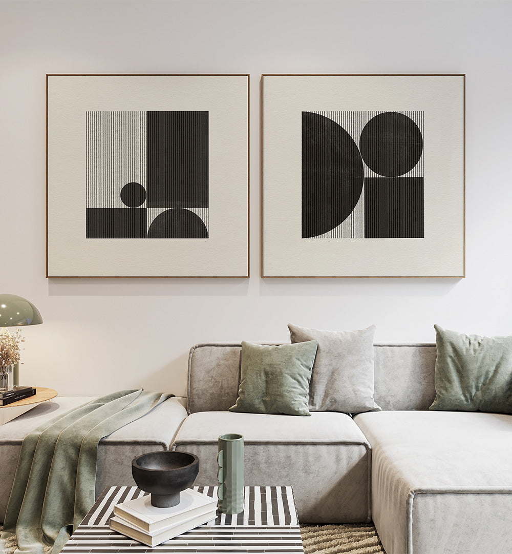 Modern living room with abstract art on the wall and a gray sofa.