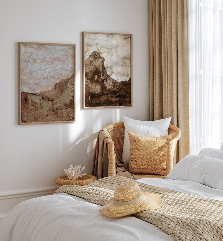 Cozy bedroom with wicker basket, straw hat, and abstract art on the wall.