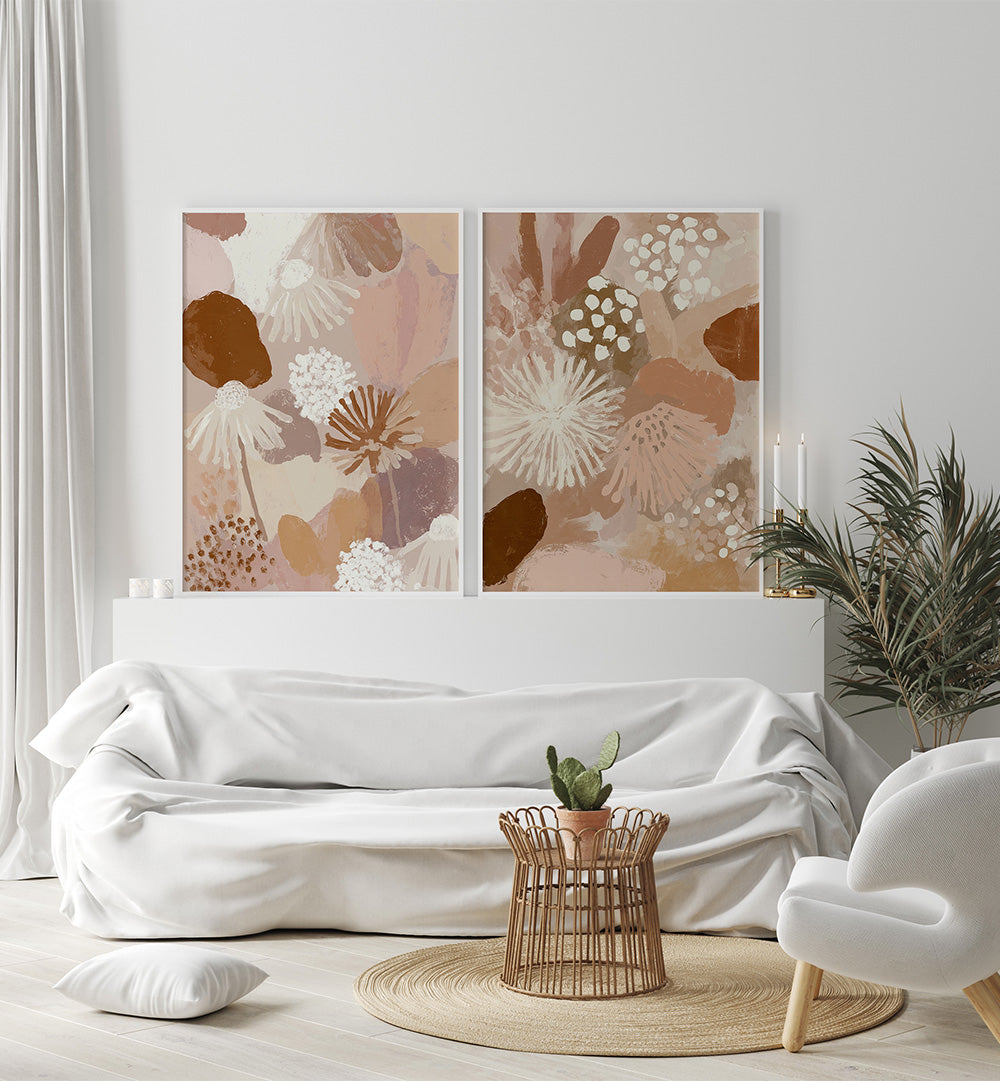 Modern living room with abstract floral artwork on the wall, white sofa, and decorative items.