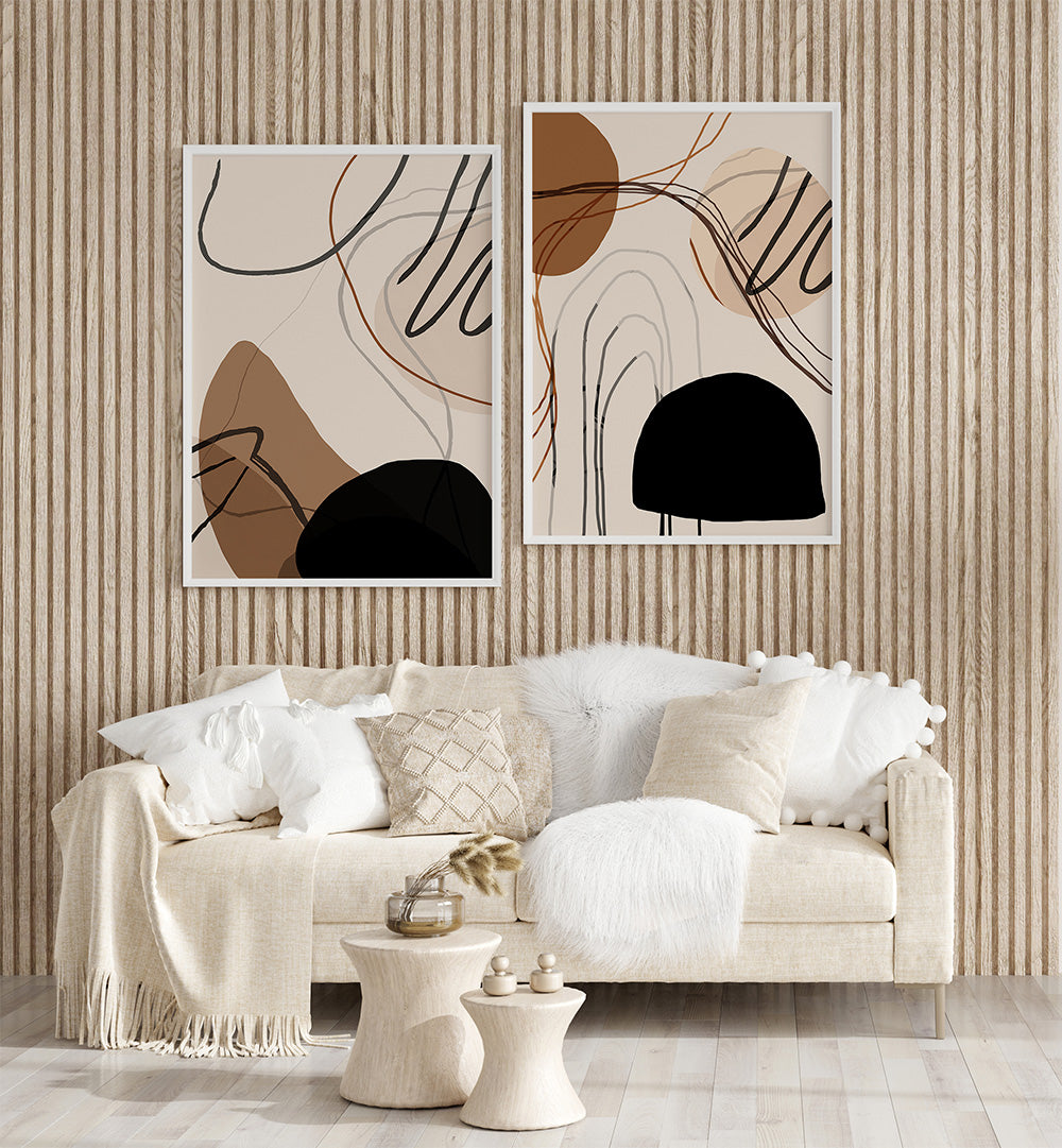 Modern living room with abstract art on the wall and a beige sofa.