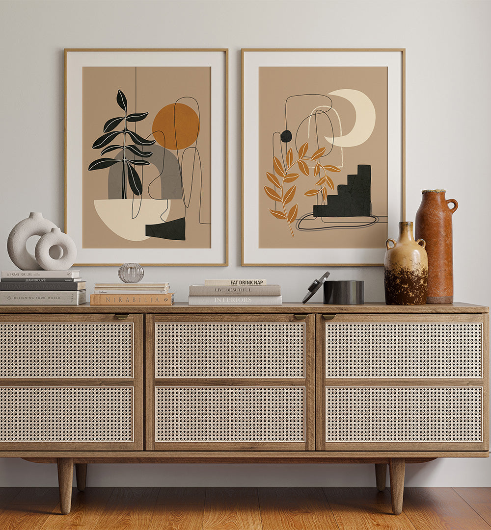 Wooden sideboard with decorative vases and abstract art on a wall.