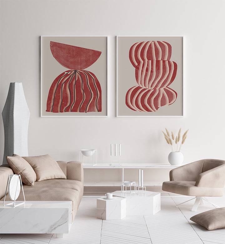 Modern living room with abstract red artwork on a white wall.