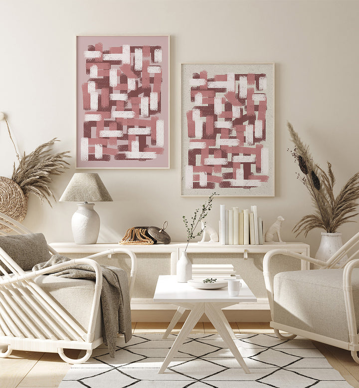 Modern living room with abstract art, white furniture, and decorative plants.