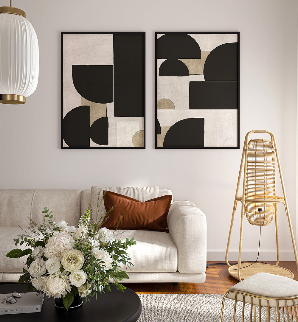 Modern living room with abstract art, white sofa, and decorative elements.