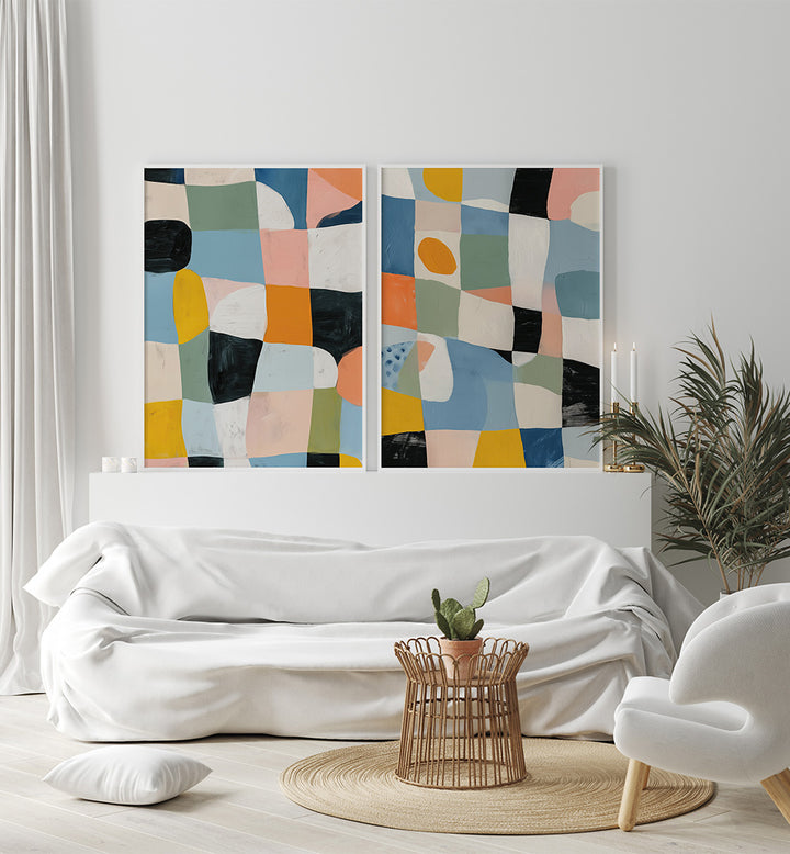 Modern living room with abstract art on the wall and a white sofa.