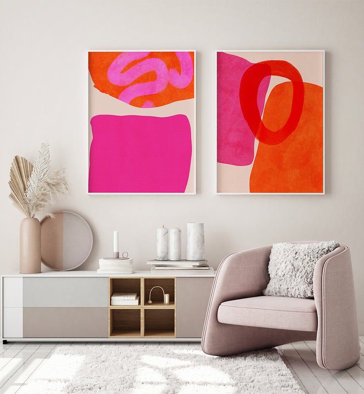 Modern living room with abstract art on the wall and a stylish armchair.