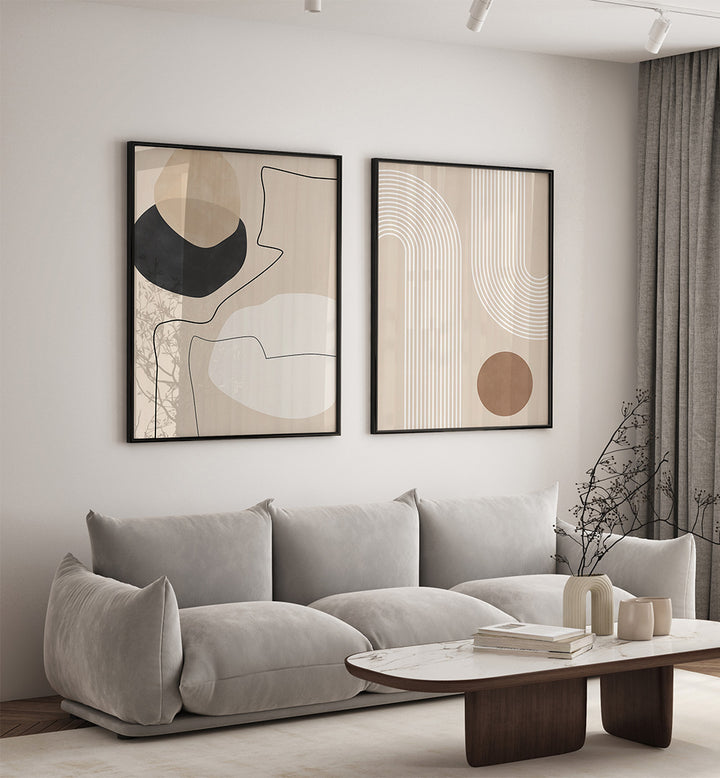 Modern living room with abstract art on the wall and a gray sofa.