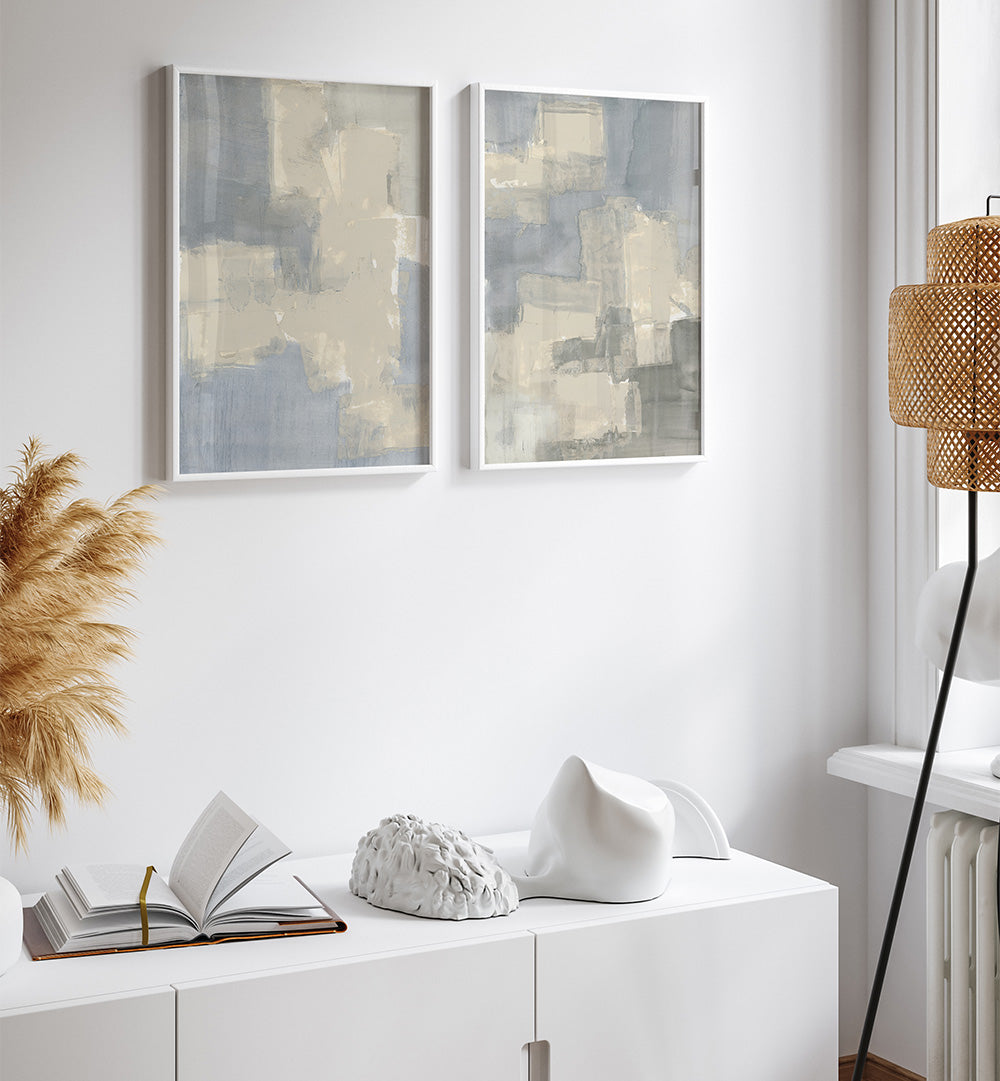 Modern interior with abstract art, decor items, and a lamp.