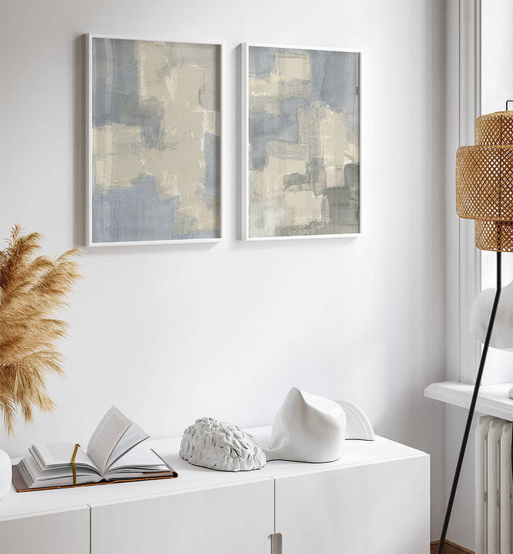 Modern interior with abstract art, decor items, and a lamp.