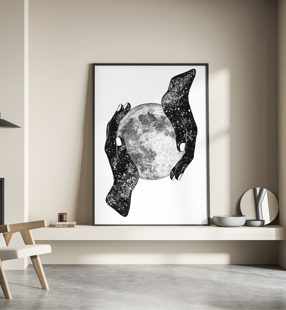 Hands cradling a moon create a stunning focal point in THE MAGIC OF THE UNIVERSE, SURREAL ART PRINTS collection.
